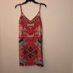 Cocktail dress with Pom poms on bottom